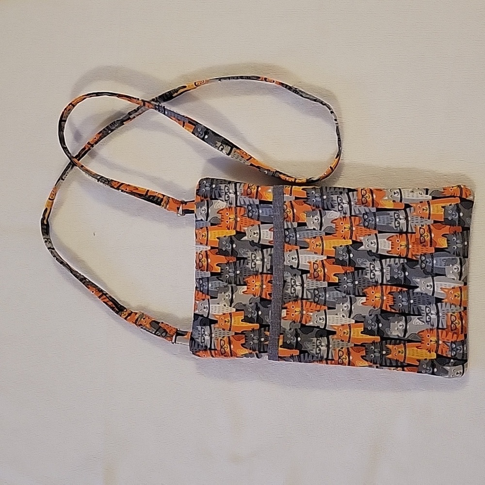 Boutique quiltted cat crossbody bag.